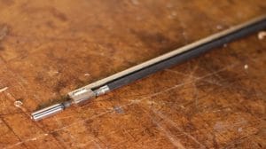 Double action guitar truss rod