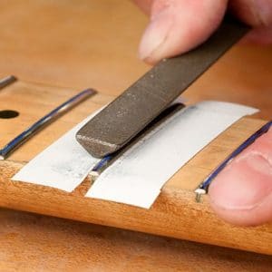 How to make sharp fret ends smooth and comfortable - StewMac