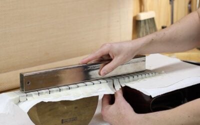 Should You Level Frets Straight, or With Relief?