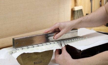Should You Level Frets Straight, or With Relief?